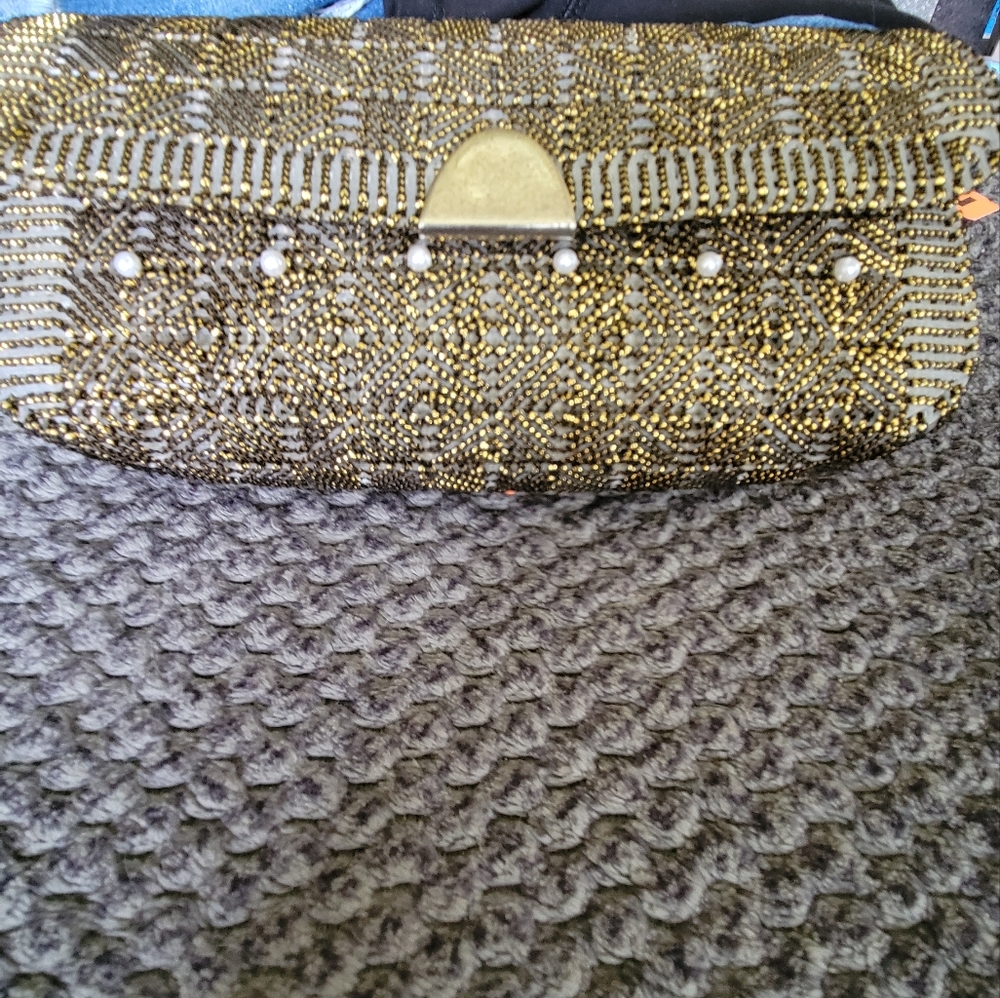Elegant Gold and Black Clutch